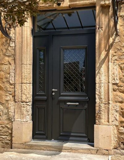 Porte d'entrée Bois alu chêne naturel sur mas en pierre 2100s à St Etienne des Sorts Gard 30